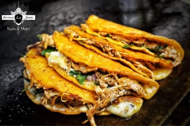 Birrieria La Santa Tacos & More food truck logo